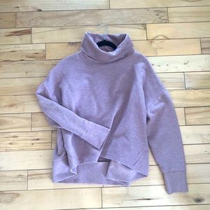 Cute crop style turtle neck sweater .